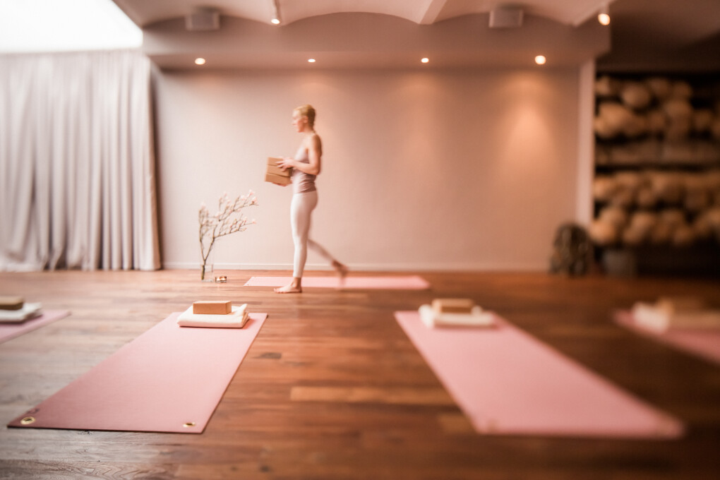 Jennie Liljefors preparing the yoga studio in Stockholm